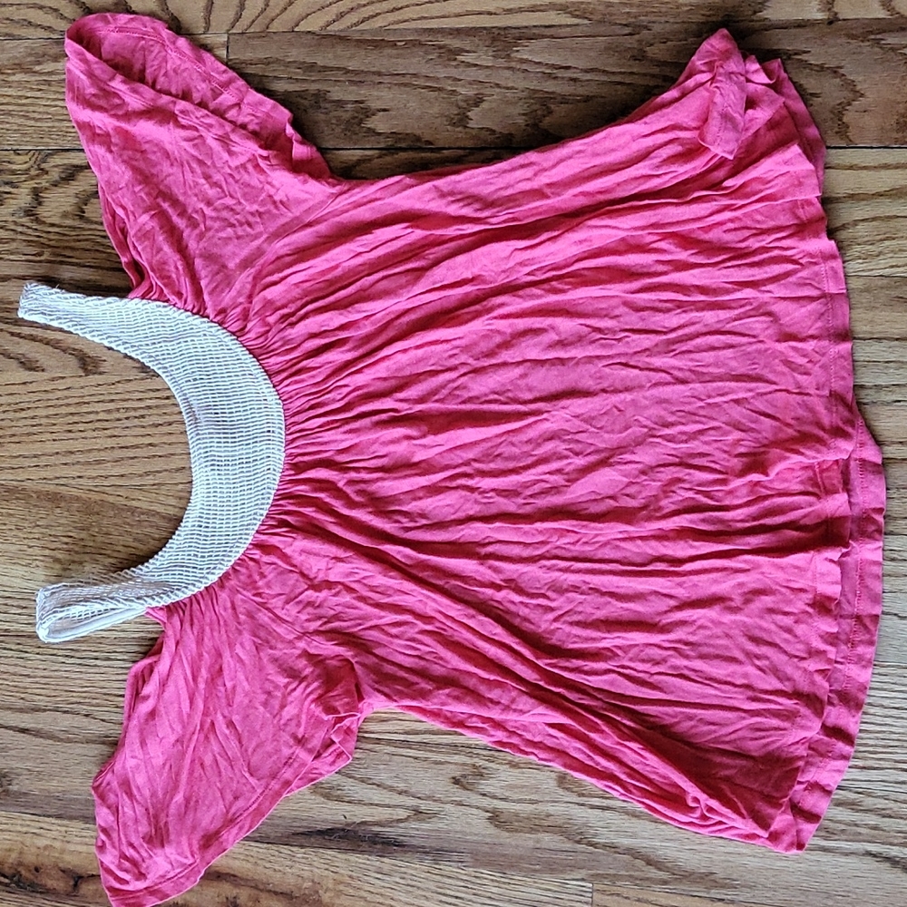 Cold shoulder pink top.